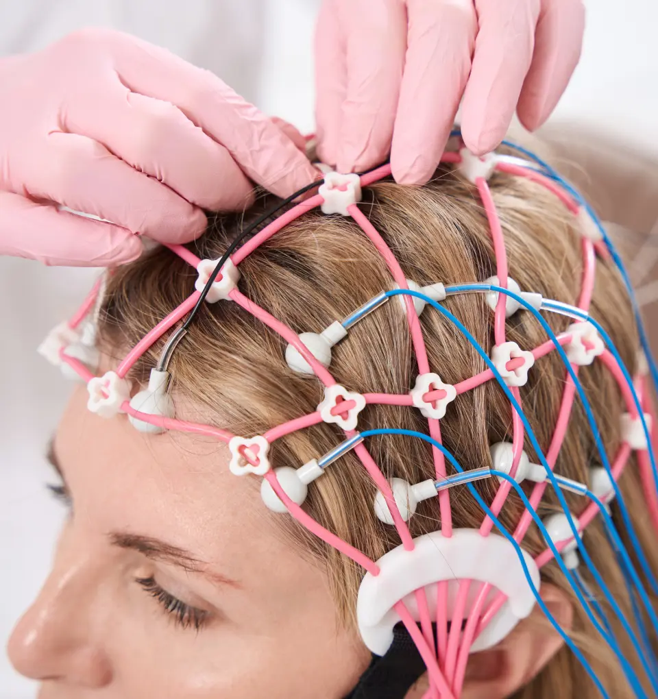 New Project(15) Person undergoing EEG brain activity test.