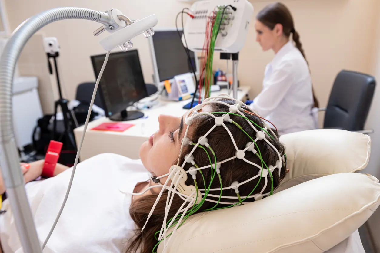 New Project(3) Person undergoing brain monitoring in clinic.
